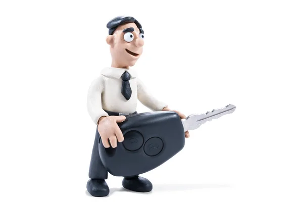 Plasticine businessman with key — Stock Photo, Image