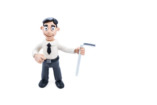 Plasticine businessman with a screwdriver — Stock Photo, Image