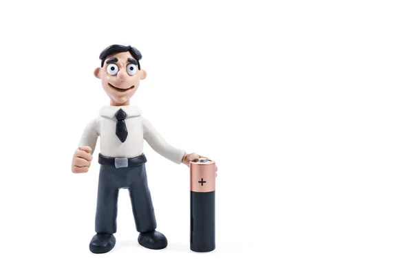 Plasticine businessman with battery — Stock Photo, Image