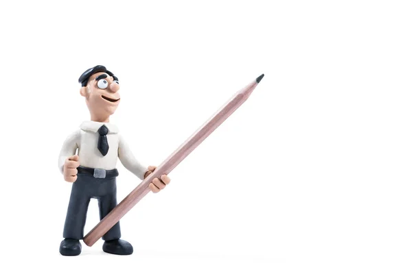 Plasticine businessman points with a pencil sideways — Stock Photo, Image