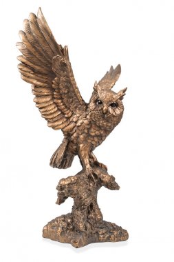 Figurine of a flying owl clipart