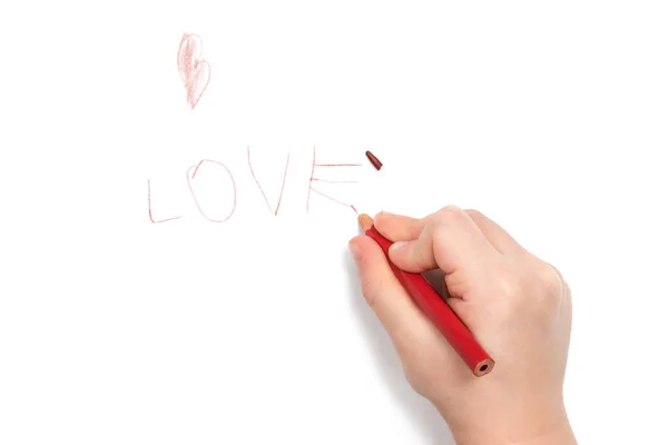 Child wrote the word love — Stock Photo, Image