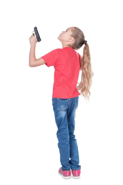 Girl aiming upwards — Stock Photo, Image