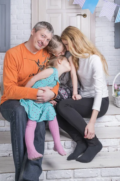 Portrait of a hugging family — Stock Photo, Image