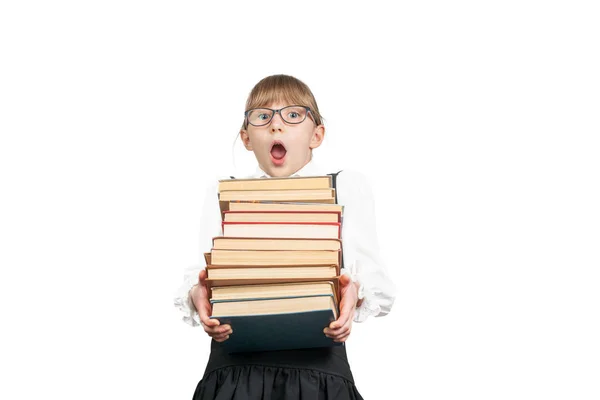 Schülerin mit einem Stapel Bücher überrascht — Stockfoto