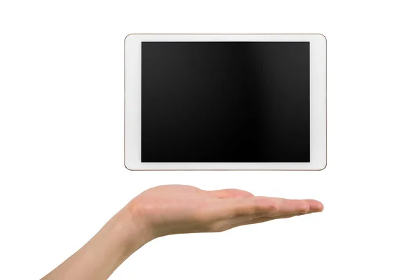 Mano mantenga la pantalla en blanco de la tableta sobre fondo blanco aislado . — Foto de Stock