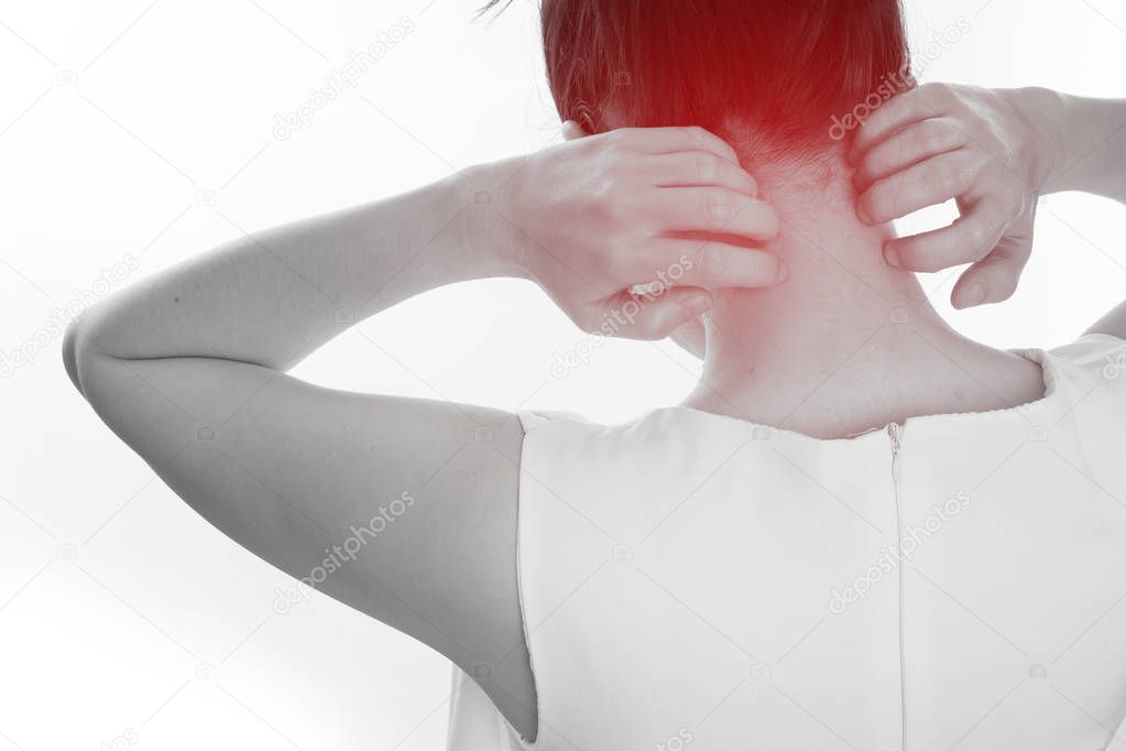 young woman scratching neck on isolated white background. concep