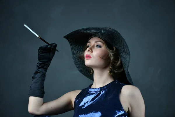 Beautiful Woman Blue Evening Dress Black Gloves Black Hat Pipe Stock Picture
