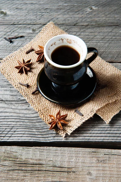 Coffee with star anise and clove — Stock Photo, Image