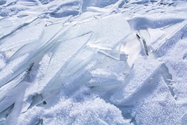 Broken ice on surface of frozen lake in Russia, Baikal Lake in winter, landscape photography — Stock Photo, Image