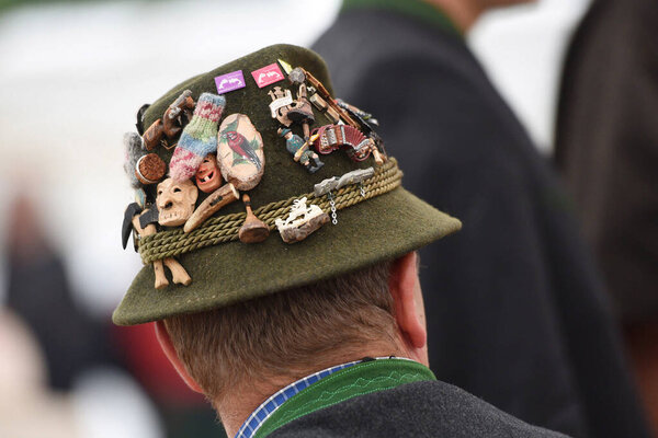 Typical alpine hat in the Salzkammergut with many badges (Upper Austria, Austria)
