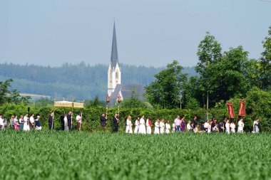 Corpus Christi procession in Rstorf, Schwanenstadt (Vcklabruck district, Upper Austria, Austria) - clipart