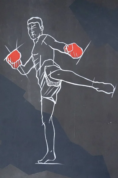 Boxeador blanco en guantes rojos pintados en la pared gris —  Fotos de Stock