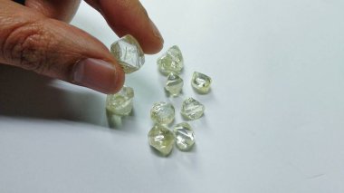 Large Natural Rough Crystal Diamonds with Clean Purity ready to be processed and cut into Polished Diamonds clipart