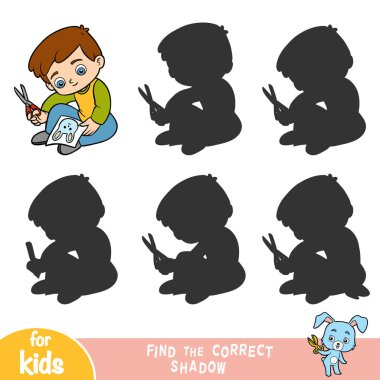 Doğru gölgeyi bul, Çocuk makasla bir resim keser.