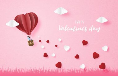 Aşkın göstergesi. Sıcak hava balonlu çift gökyüzünde uçuyor..
