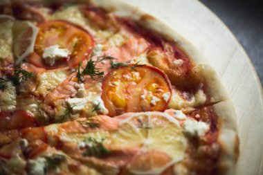 İtalyan pizza. fotoğrafı kapatın. makro çekim. Gıda kavramı.