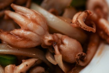 Haşlanmış ahtapot. Yakın çekim fotoğraf. Makro fotoğrafçılık. Gıda kavramı arka plan