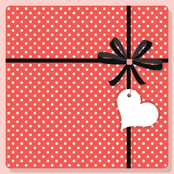 Linda moda rosa y blanco lunares patrón de regalo de vista superior con arco y corazón colgante etiqueta de forma — Archivo Imágenes Vectoriales