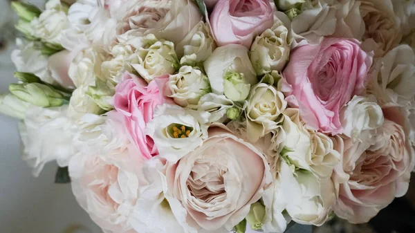 Bouquet of flowers of the groom with a belt.