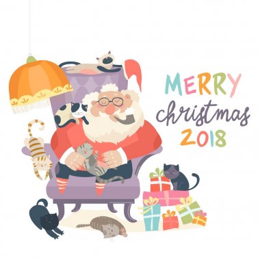 Noel Baba koltuk wih cats içinde oturan