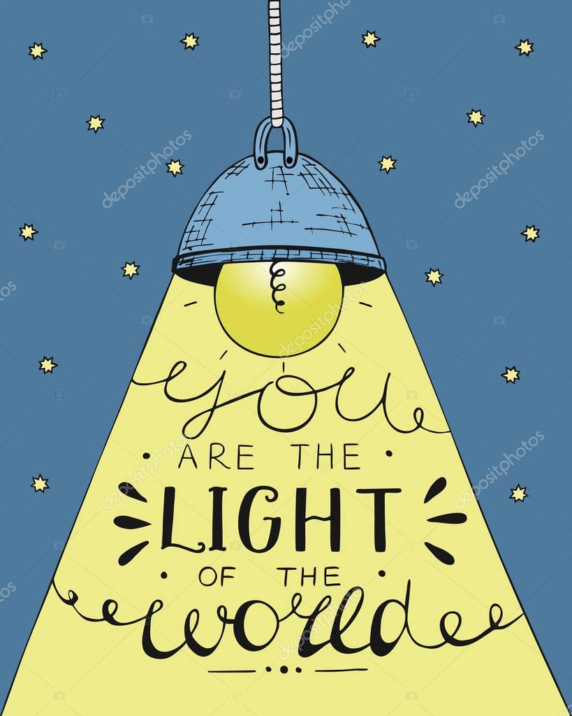 Hand lettering You the light of the world, made on the star background with glowing light bulb. Biblical background. Christian poster.