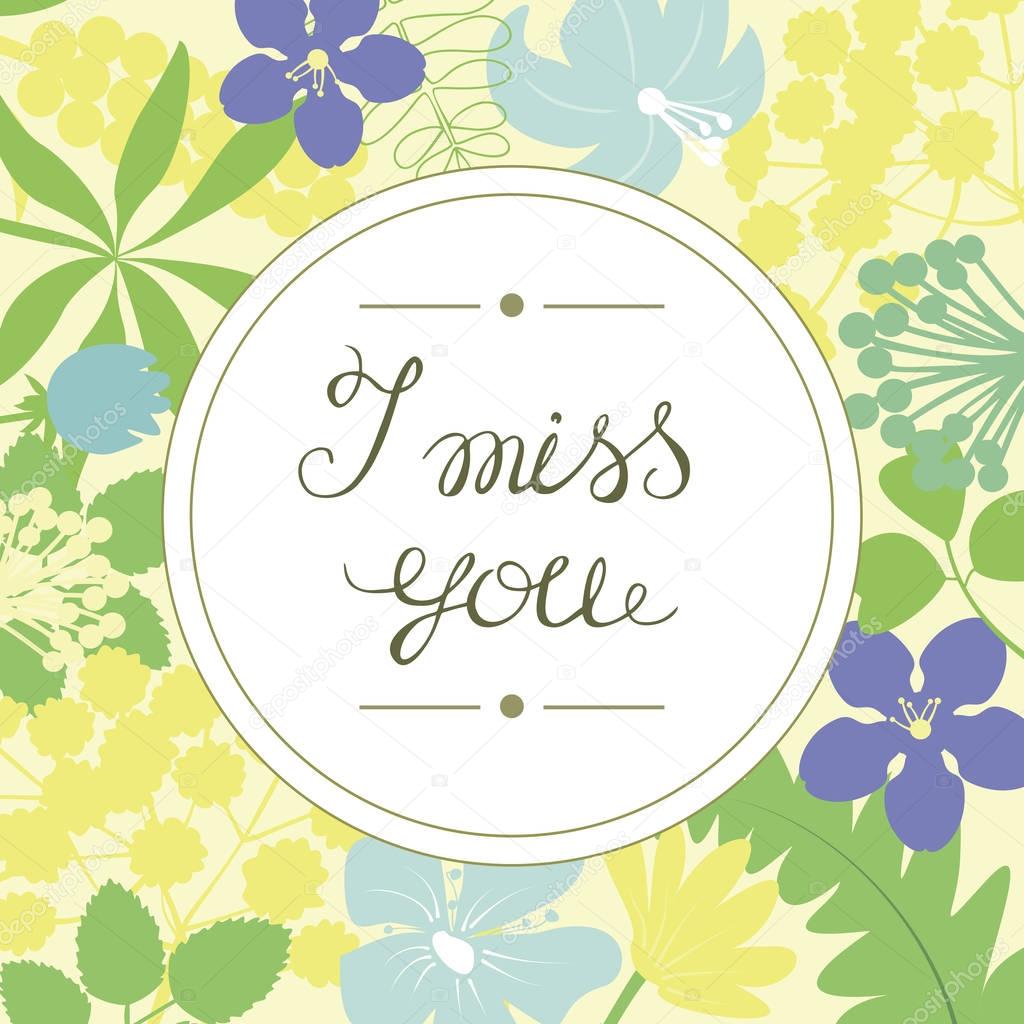 Hand lettering I miss you, performed in the round on a floral background.