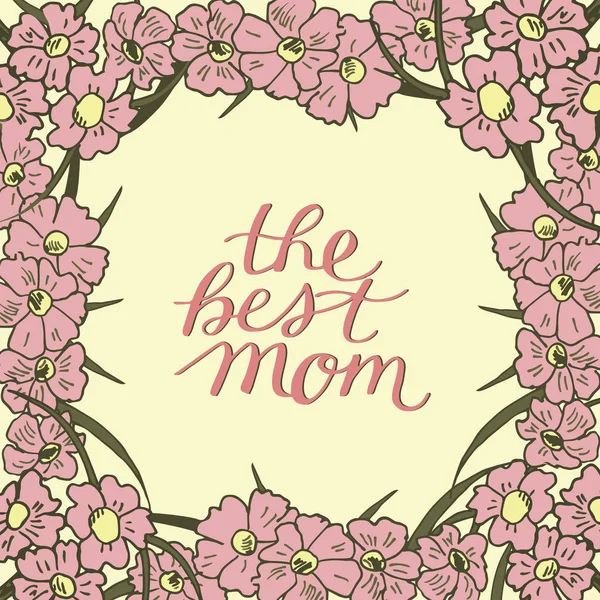 Mão lettering A melhor mãe feita em fundo floral com flores rosa . — Vetor de Stock