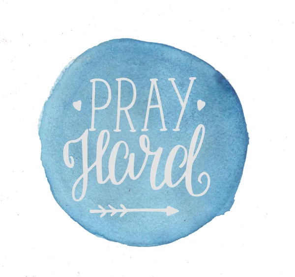 Hand lettering Pray hard, made on a blue watercolor background — Stock Photo, Image