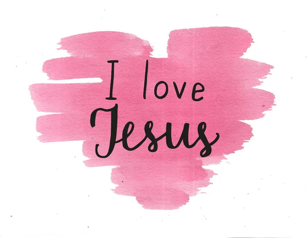 Hand lettering I love Jesus on watercolor background.