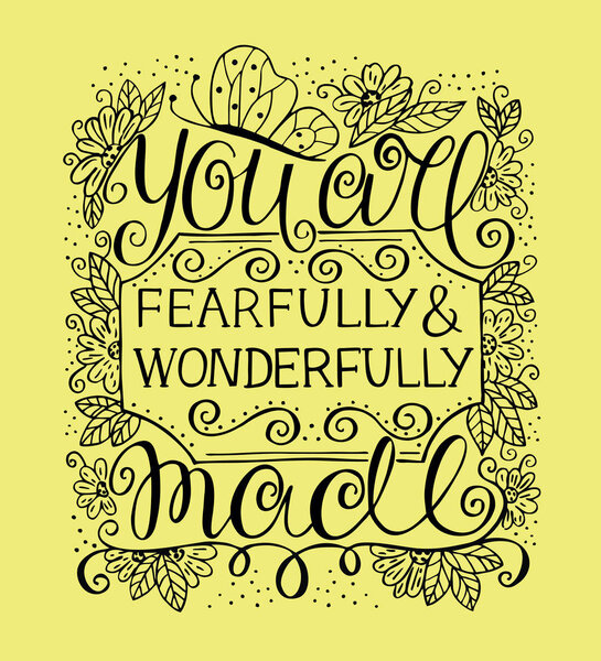 Hand lettering You are fearfully and wonderfully made near flowers and butterfly 