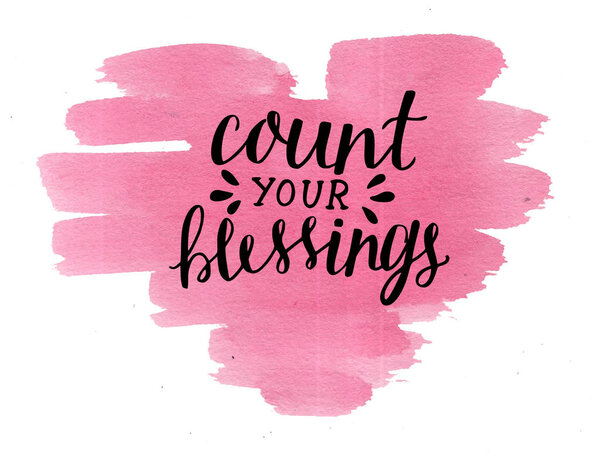 Hand lettering Count your blessing on watercolor heart.