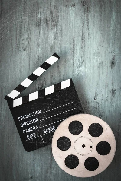 Clapperboards and the reel of film — Stock Photo, Image