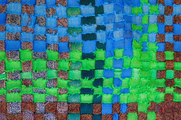El yapımı çok renkli çizgili kumaştan — Stok fotoğraf