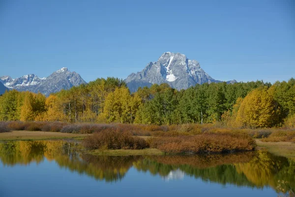 Great Titan National Park with fall colors and snake river