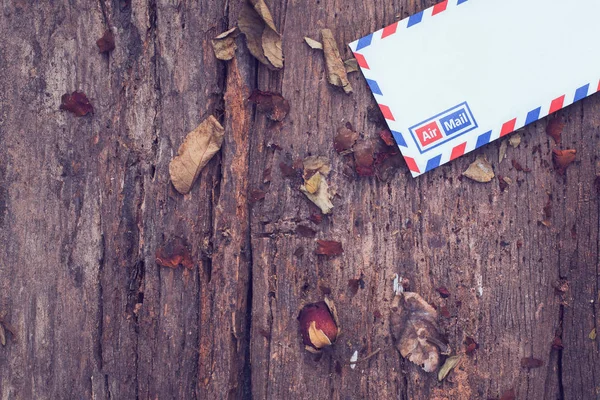 Envelopes and dried roses — Stock Photo, Image