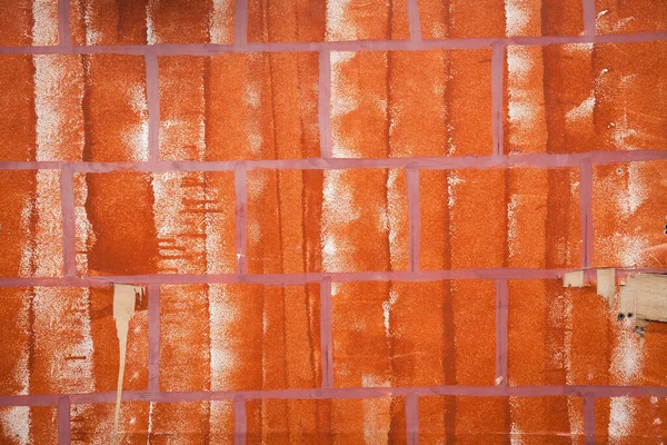 オレンジ塗装の木製の松の板を密接な背景組成物として行に横たわっていた — ストック写真