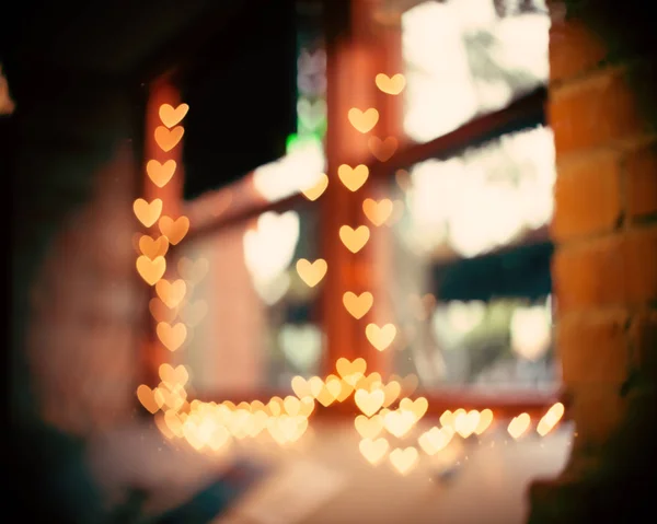 Cafe window with hearts