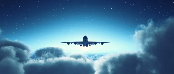 Airplane flying over cloudy sky. — Stock Photo, Image