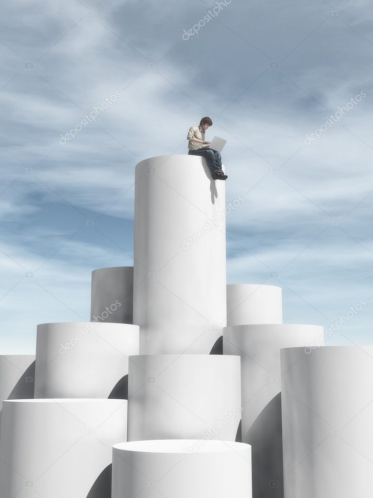 Man sitting on top of cylinders