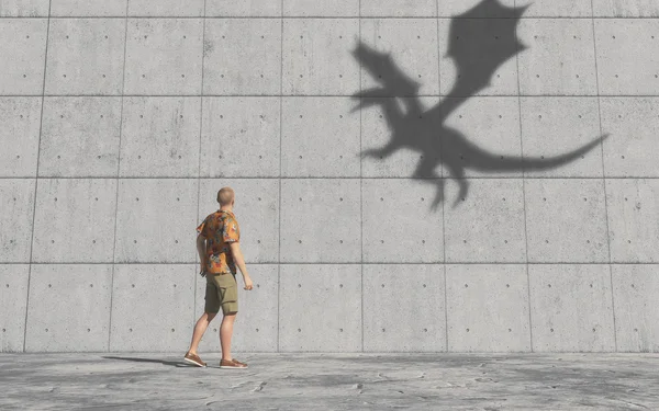 Man looking  at the shadow of a dragon — Stock Photo, Image