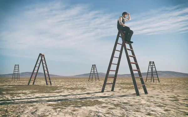 Businessman climbed on top of the stairs — Stock Photo, Image