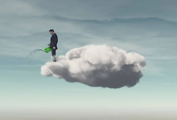Geschäftsmann steht über einer Wolke, die Regen erzeugt — Stockfoto