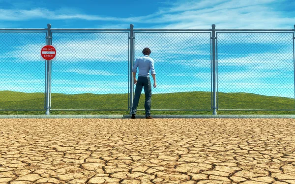Man Standing Drought Cracked Desert Landscape Fence Meadow Dry Land — Stock Photo, Image