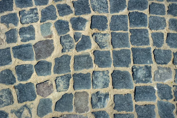 Kopfsteinpflaster aus Granitquadern — Stockfoto