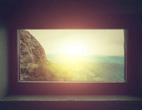 Silhouettes of Dirty glass window with sunset background