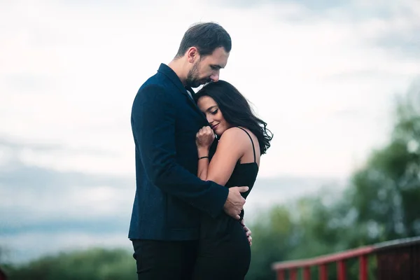 Guy hugging tenderly his girlfriend — Stock Photo, Image