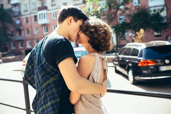 Happy couple in the street looking each other — Stock Photo, Image