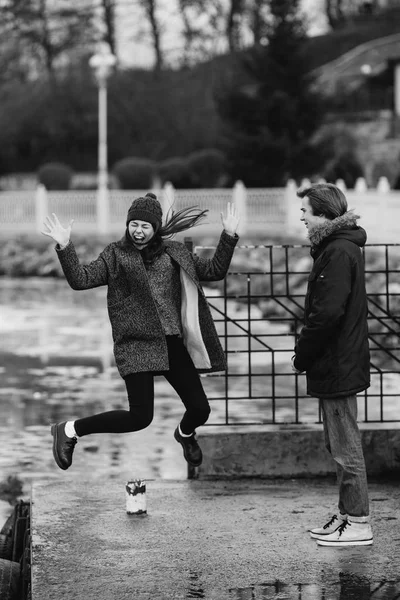 Beautiful couple having fun on the pier — Stock Photo, Image