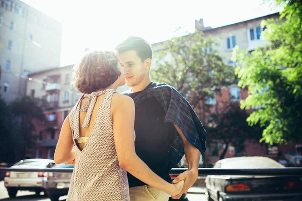 Happy couple in the street looking each other — Stock Photo, Image